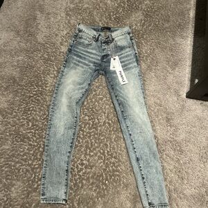 Size 28 in men, worn once, comes with bag